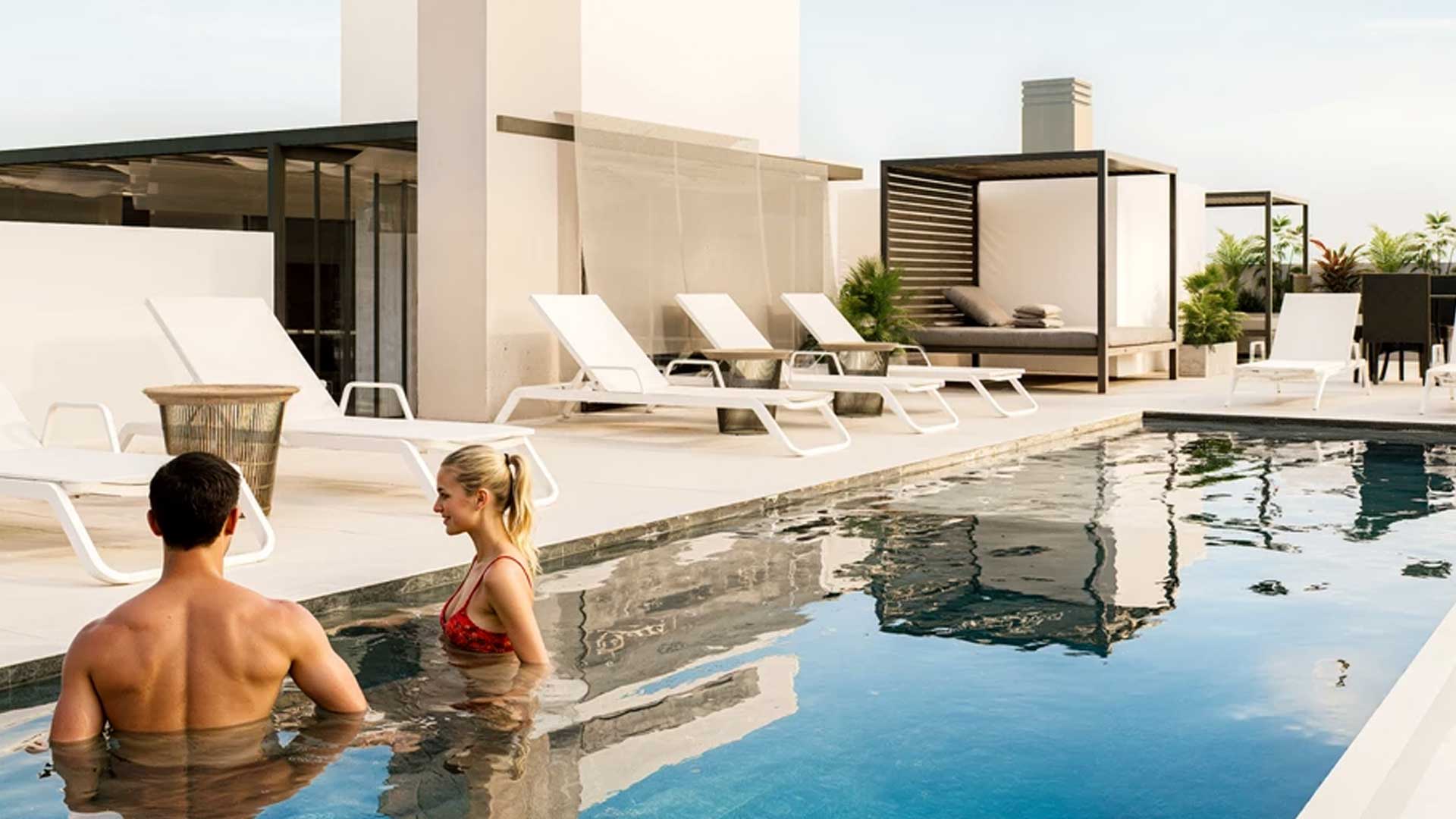 Rooftop pool with lounge area